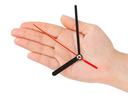 Hand with clock-hands isolated on white backgroundの写真素材
