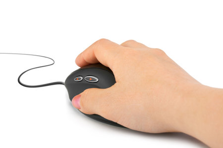 Hand and computer mouse isolated on white backgroundの写真素材