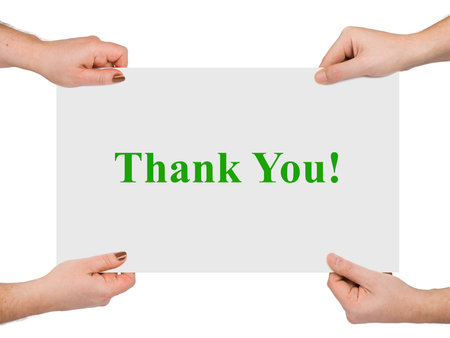 Hands and paper banner Thank You isolated on white backgroundの写真素材