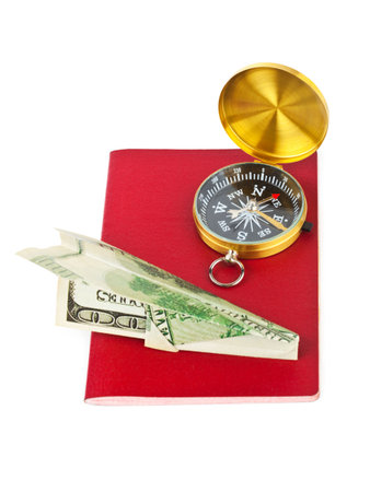 Passport, compass and money plane - travel concept isolated on white backgroundの写真素材