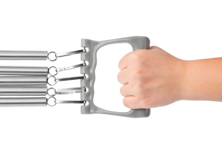 Hand with expander isolated on white backgroundの写真素材