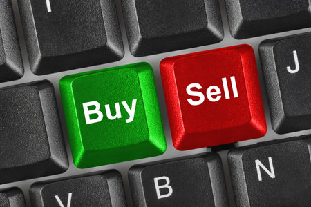Computer keyboard with two business keys - e-commerce concept Computer keyboard with two business keys - e-commerce concept