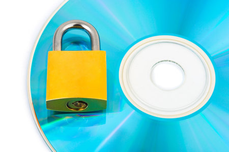 Computer disk and lock isolated on white backgroundの写真素材
