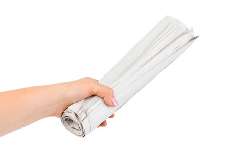 Hand giving newspapers isolated on white backgroundの写真素材