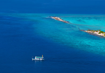 Tropical island at Maldives - aerial viewの写真素材