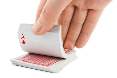 Hand and playing cards isolated on white backgroundのeditorial素材