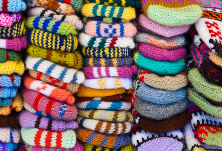 Pile of wool clothing - winter fashion background