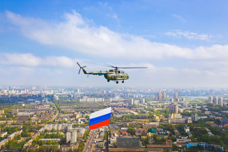 Helicopter with russian flag over Moscow at parade of victory day - aerial viewの写真素材