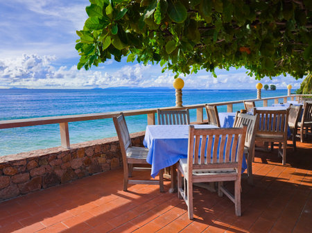 Cafe on tropical beach - travel backgroundの写真素材