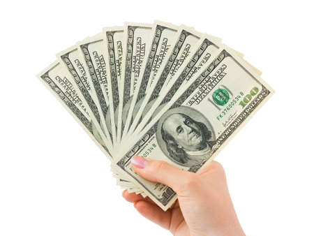 Hand with money isolated on white background Hand with money isolated on white background