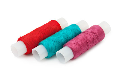 Spools of thread isolated on white background