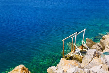 Stairs to sea - vacation beach backgroundの写真素材