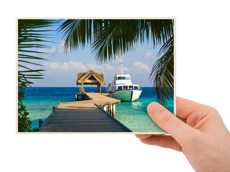 Photography in hand  my photo  isolated on white backgroundの写真素材