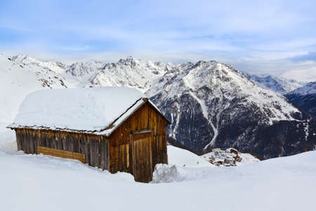 House on mountains at ski resort Solden Austria - nature and sport backgroundのeditorial素材