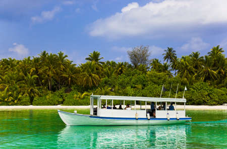 Tropical island and boat - travel background