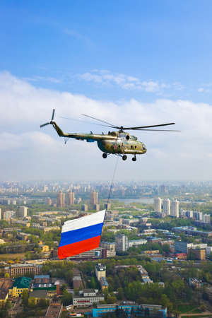 Helicopter with russian flag over Moscow at parade of victory day - aerial viewのeditorial素材