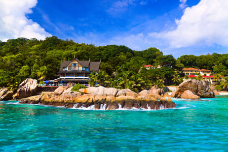 Hotel at tropical beach, La Digue, Seychelles - vacation backgroundのeditorial素材
