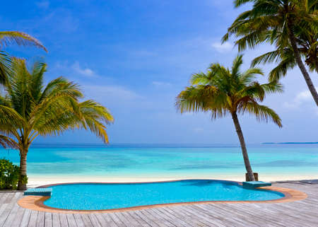Pool on a tropical beach, vacation backgroundのeditorial素材