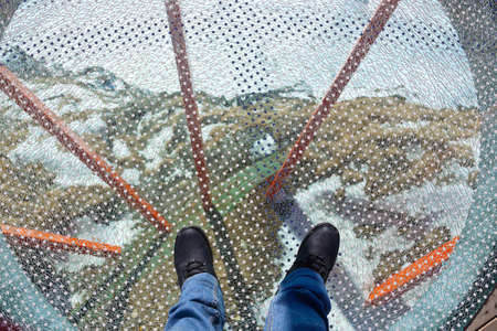 Glass floor - viewpoint at mountains ski resort Bad Gastein Austriaの写真素材