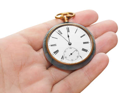 Retro watch in hand isolated on white background