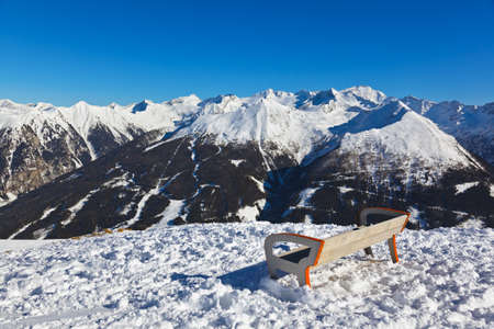 Bench at mountains ski resort Bad Gastein Austria - nature and sport backgroundの写真素材