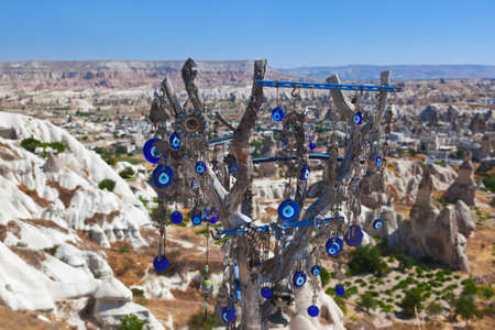 Tree and evil eye amulet in Cappadocia Turkey - nature backgroundの写真素材