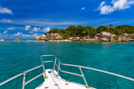 Tropical island and boat on Seychelles - vacation backgroundのeditorial素材