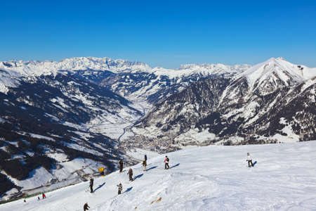 Skiers at mountains ski resort Bad Gastein Austria - nature and sport backgroundの写真素材