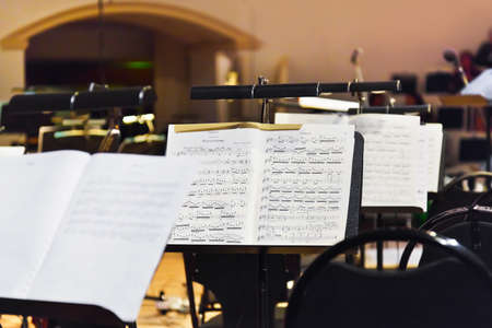 Musical instruments and sheet music - art backgroundの写真素材