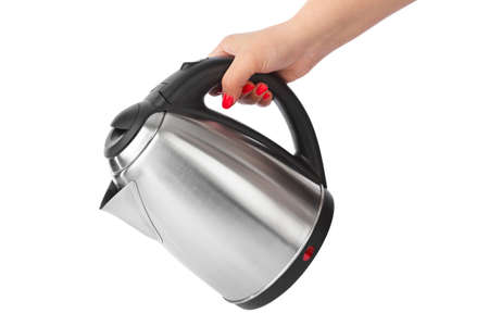 Electric kettle in hand isolated on white background