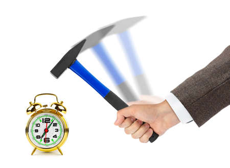 Hand with hammer and alarm clock isolated on white backgroundの写真素材