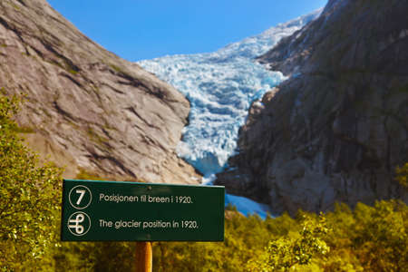 Sign - Melting Briksdal glacier - Norway - nature and travel backgroundの写真素材