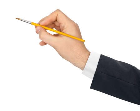 Hand with paintbrush isolated on white backgroundの写真素材