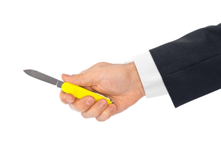 Hand with knife multitool isolated on white background