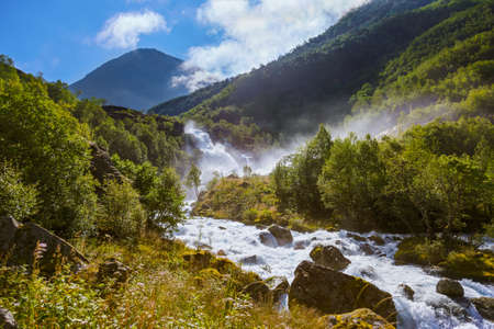 Waterfall near Briksdal glacier - Norway - nature and travel backgroundの写真素材