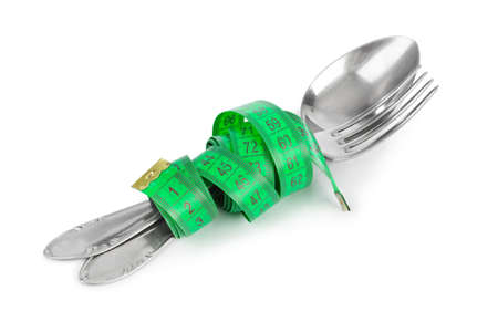 Fork spoon and measuring tape isolated on white background