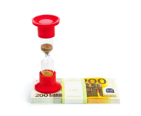Hourglass and money - business concept isolated on white background