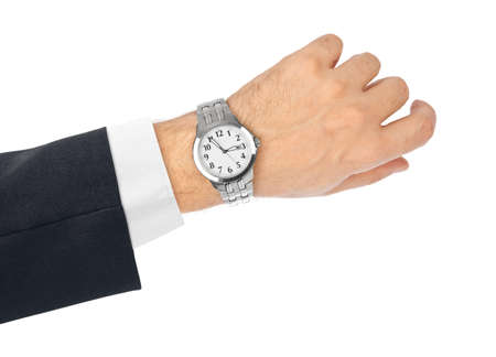 Hand and watch isolated on white backgroundの写真素材