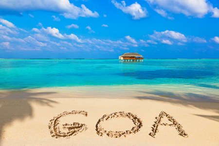 Word Goa on beach - concept holiday backgroundのeditorial素材