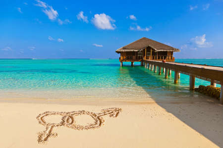 Sex symbols on beach - concept holiday backgroundのeditorial素材