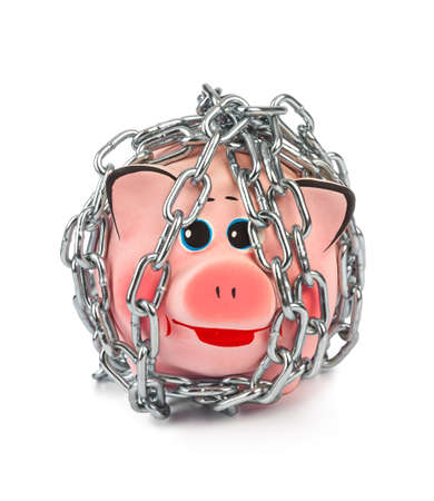 Piggy bank and chains isolated on white backgroundの写真素材