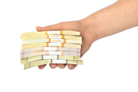 Hand with money isolated on white backgroundの写真素材