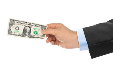Hand with money isolated on white background