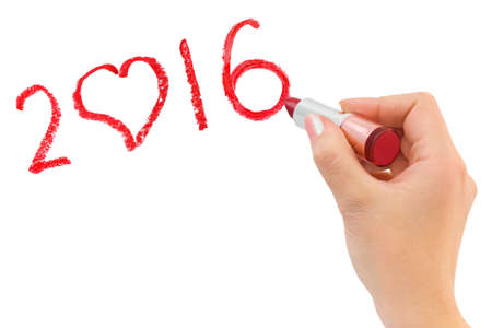 Hand with lipstick drawing 2016 isolated on white backgroundの写真素材