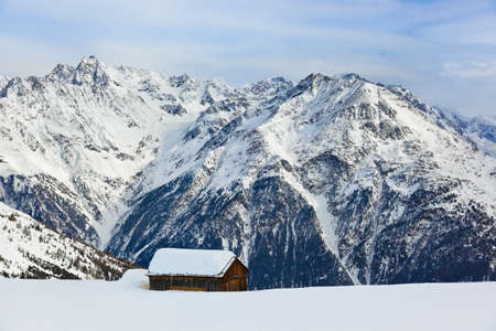 House on mountains at ski resort in Solden, Austriaの写真素材