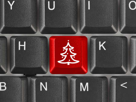 Computer keyboard with Christmas tree keyの写真素材