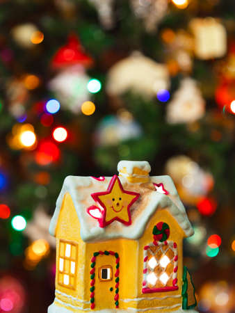 Lighting house - christmas tree on backgroundの写真素材