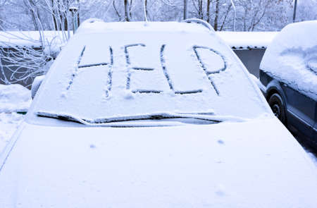 Word help on snow covered car - winter transportation problemsの写真素材