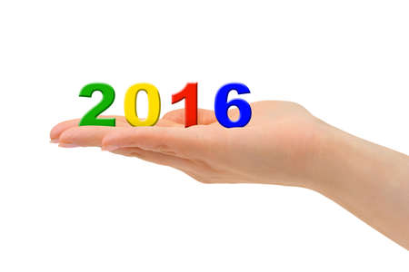 Numbers 2016 in hand isolated on white backgroundの写真素材