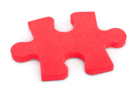 Piece of puzzle isolated on white backgroundの写真素材